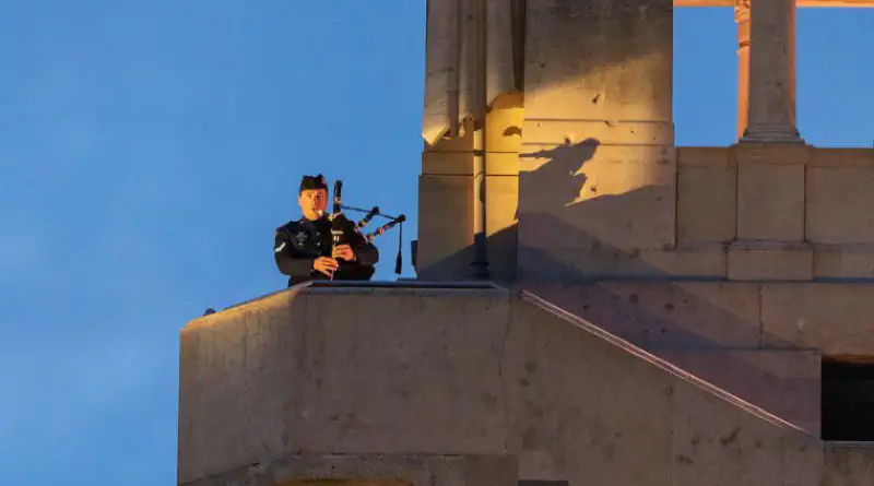 Corporal Robert Scott plays bagpipes at the memorial in Villers-Bretonneux, France.